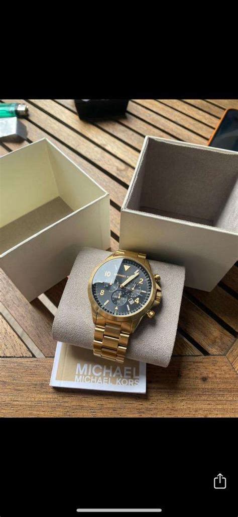 michael kors siyah saat|Michael Kors altın saat.